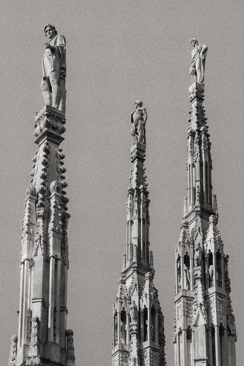 Gothic spires of Milan's Duomo against the sky