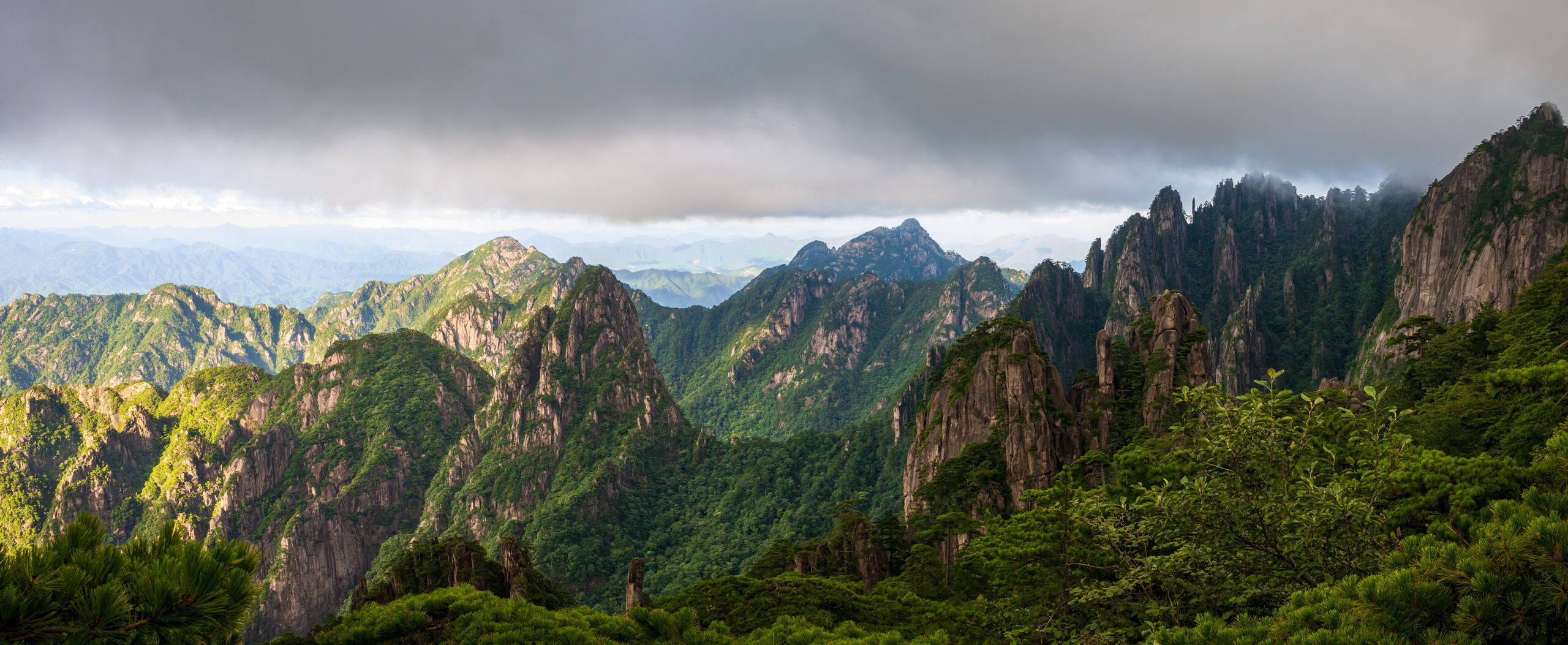 Layered granite peaks fading into mist, Huangshan